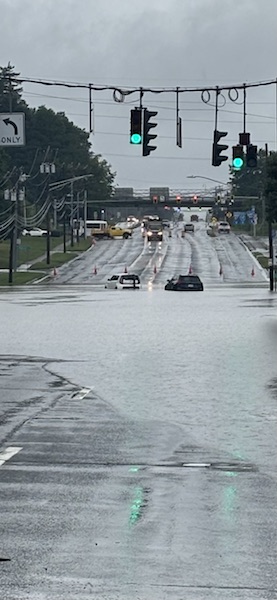 cars driven into and
stalled out in floodwaters on Western Ave 29 July 2026